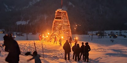 Hotels und Ferienwohnungen im Oberallgäu - Funken Hinterstein - Funkenfeuer im Oberallgäu