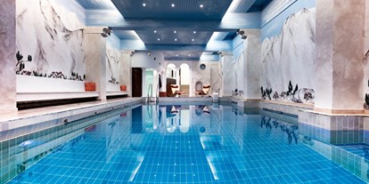 Hotels und Ferienwohnungen im Oberallgäu - Riezlern - Schwimmbad - Hotel Erlebach - 4* Wellnesshotel im Kleinwalsertal