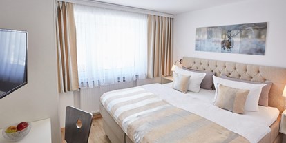 Hotels und Ferienwohnungen im Oberallgäu - Parken & Anreise: kostenloser Parkplatz - Bayern - Doppelzimmer im bichl 761 - Alpin Hotel bichl 761