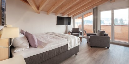 Hotels und Ferienwohnungen im Oberallgäu - Parken & Anreise: E-Ladestation - Bayern - 765-14 Dachzimmer Superior - Alpin Hotel bichl 761