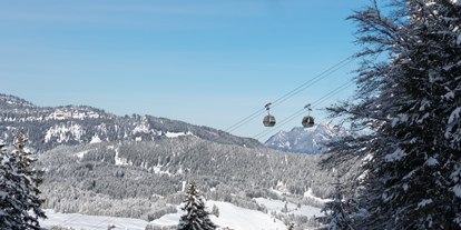 Hotels und Ferienwohnungen im Oberallgäu - Kategorien: Outdoorattraktion - Riezlern Riezlern - Ort - Pistenvergnügen grenzenlos an der Kanzelwandbahn im Kleinwalsertal - Die Kanzelwandbahn - grenzenloses Wintervergnügen