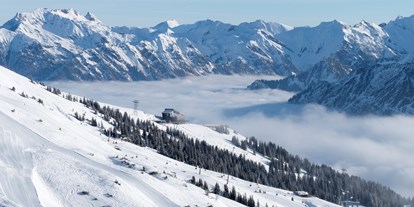Hotels und Ferienwohnungen im Oberallgäu - Saison: Winter - Riezlern - Pistenvergnügen grenzenlos an der Kanzelwandbahn im Kleinwalsertal - Die Kanzelwandbahn - grenzenloses Wintervergnügen