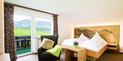 Hotels und Ferienwohnungen im Oberallgäu - Freizeit: Whirlpool - Doppelzimmer "Huimat" im Gästehaus - Ihr Alpenblick - Hotel & Restaurant in Fischen im Allgäu