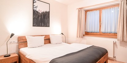 Hotels und Ferienwohnungen im Oberallgäu - Freizeit: Golfplatz (max. 3km entfernt) - Oberstdorf - Alpenhaus Oberstdorf - Schlafzimmer 2 App. 401 | gipfelGLÜCK (Untergeschoss) - ALPENHAUS Oberstdorf