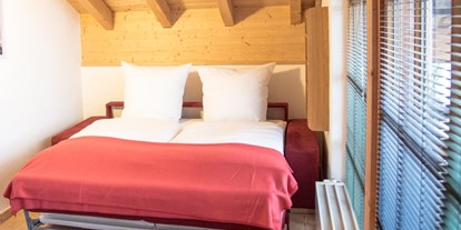 Hotels und Ferienwohnungen im Oberallgäu - Ausstattung: WLAN inklusive - Alpenhaus Oberstdorf - Schlafsofa App. 402 | weitBLICK - ALPENHAUS Oberstdorf