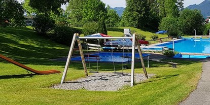 Hotels und Ferienwohnungen im Oberallgäu - Saison: Sommer - Freibad Rettenberg