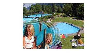 Hotels und Ferienwohnungen im Oberallgäu - PLZ 87534 (Deutschland) - Freibad Thalkirchdorf