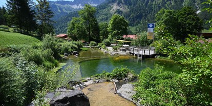 Hotels und Ferienwohnungen im Oberallgäu - Kategorien: Freibad / See - Prinze Gumpe - Badegarten in Hinterstein im Allgäu - Naturbad Prinze Gumpe in Bad HIndelang - Hinterstein im Allgäu 