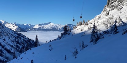 Hotels und Ferienwohnungen im Oberallgäu - Kategorien: Wanderweg - Oberstdorf - Skigebiet Nebelhorn über Oberstdorf im Oberallgäu - Die Nebelhornbahn im Winter 