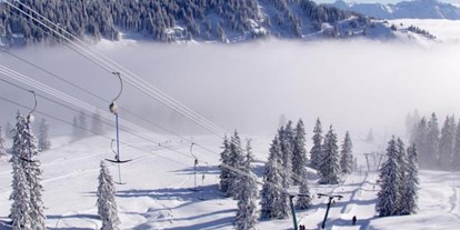 Hotels und Ferienwohnungen im Oberallgäu - Parken & Anreise: Busparkplatz - Obermaiselstein - Skigebiet Grasgehren am Riedbergpass im Oberallgäu - Sonnen- Skiparadies Grasgehren am Riedbergpass