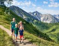 Veranstaltungen im Oberallgäu: Trachtenkapelle Riezlern mit Alphornbläsern auf der Kanzelwand - Trachtenkapelle Riezlern mit Alphornbläsern auf der Kanzelwand