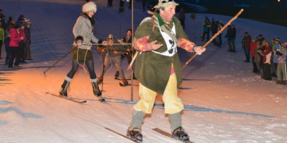 Hotels und Ferienwohnungen im Oberallgäu - Historisches Skifahren in Fischen im Allgäu - Historisches Skirennen 2023 am Stinesser in Fischen