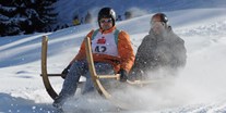 Hotels und Ferienwohnungen im Oberallgäu - Ostrachtaler Hornerschlittenrennen in Vorderhindelang - Ostrachtaler Hornerschlittenrennen in Vorderhindelang