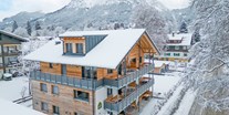 Hotels und Ferienwohnungen im Oberallgäu - Freizeit: Skifahren - Oberstdorf - Die Dorf Suites im Winterkleid - Dorf Suites - natürlich mit Stil